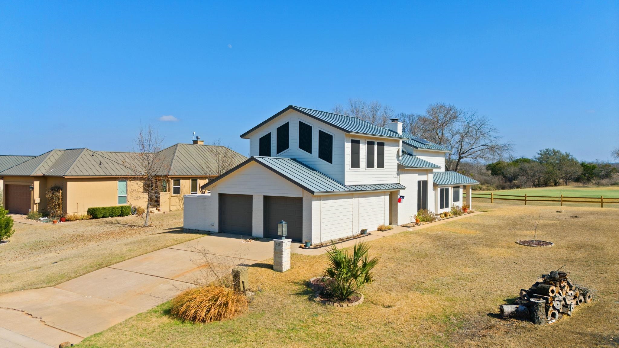 HORSESHOE BAY WEST LT W21007-B (house) and W21006-A (vacant lot)